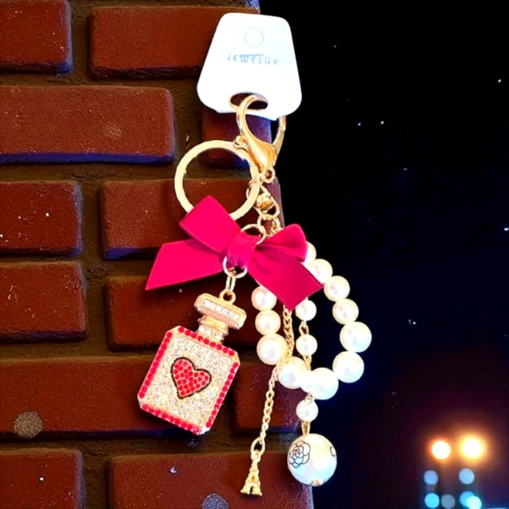 Elegant Red and Gold Perfume Bottle Shaped Charm with Pearl Accents